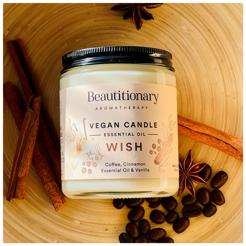 A vegan candle with Coffee and Cinnamon blends