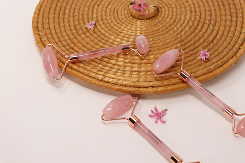 Rose quartz roller for face and body lifting